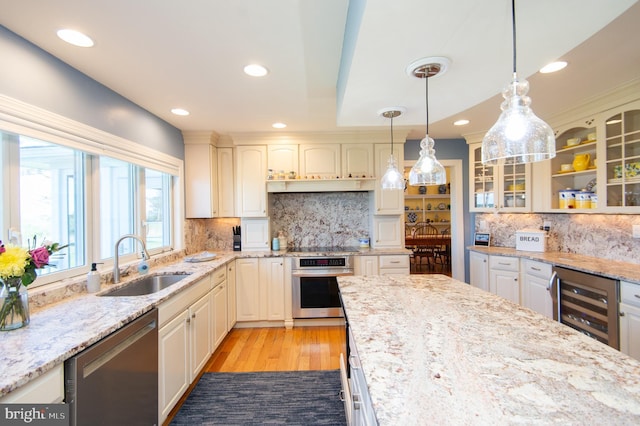 4906 Timbermarsh Ln, Woolford, MD 21677 - kitchen featuring stainless steel appliances, a sink, beverage cooler, light wood-style flooring, and glass insert cabinets
