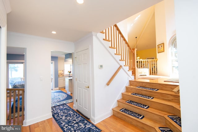 4906 Timbermarsh Ln, Woolford, MD 21677 - stairs with wood finished floors, recessed lighting, ornamental molding, and baseboards