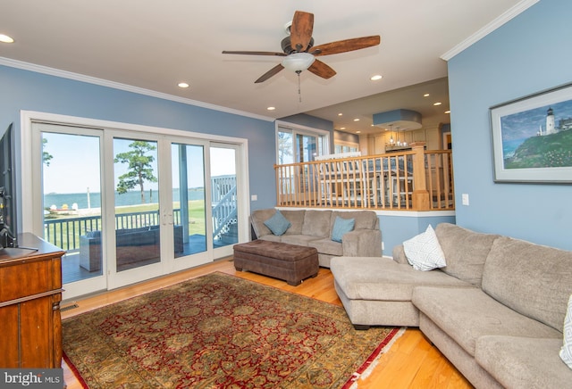 4906 Timbermarsh Ln, Woolford, MD 21677 - living room with wood finished floors, a ceiling fan, ornamental molding, a water view, and recessed lighting