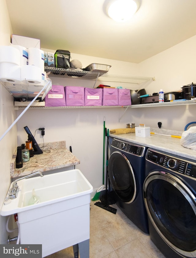 4906 Timbermarsh Ln, Woolford, MD 21677 - washroom featuring separate washer and dryer and light tile patterned floors