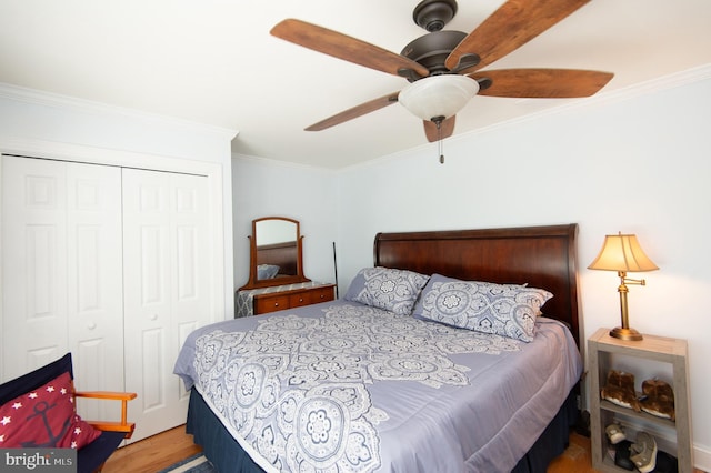 4906 Timbermarsh Ln, Woolford, MD 21677 - bedroom with crown molding, a closet, wood finished floors, and a ceiling fan