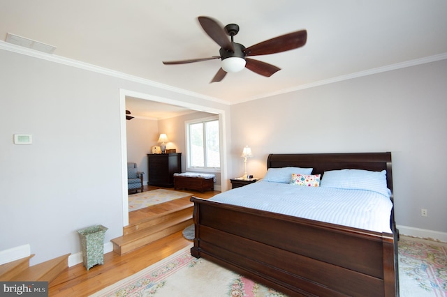 4906 Timbermarsh Ln, Woolford, MD 21677 - bedroom with baseboards, crown molding, light wood finished floors, and a ceiling fan