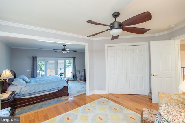4906 Timbermarsh Ln, Woolford, MD 21677 - bedroom with light wood finished floors, access to exterior, baseboards, a ceiling fan, and ornamental molding