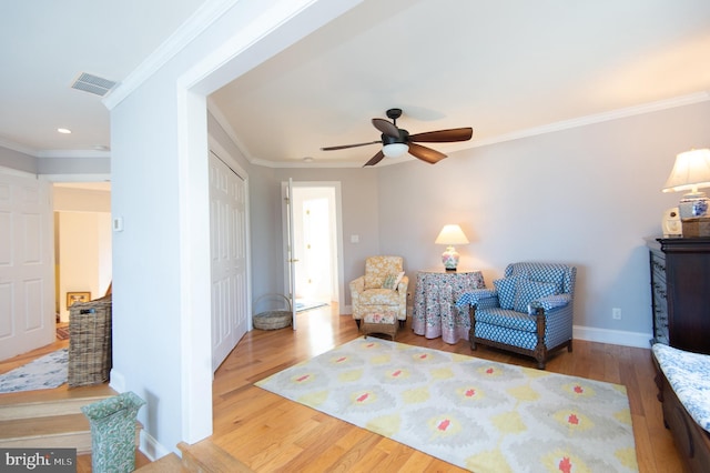 4906 Timbermarsh Ln, Woolford, MD 21677 - sitting room with wood finished floors, a ceiling fan, crown molding, recessed lighting, and baseboards