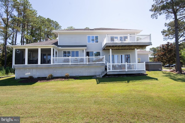 4906 Timbermarsh Ln, Woolford, MD 21677 - rear view of house featuring a lawn, a sunroom, and a deck