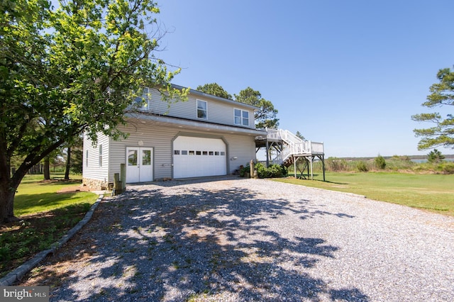 4906 Timbermarsh Ln, Woolford, MD 21677 - view of front of property with an attached garage, driveway, stairway, and a front lawn
