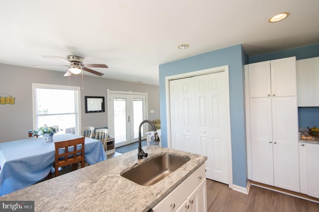 4906 Timbermarsh Ln, Woolford, MD 21677 - kitchen with a sink, a ceiling fan, white cabinets, wood finished floors, and recessed lighting