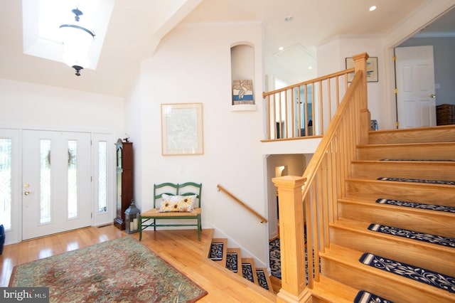 4906 Timbermarsh Ln, Woolford, MD 21677 - foyer featuring wood finished floors, stairs, crown molding, and recessed lighting