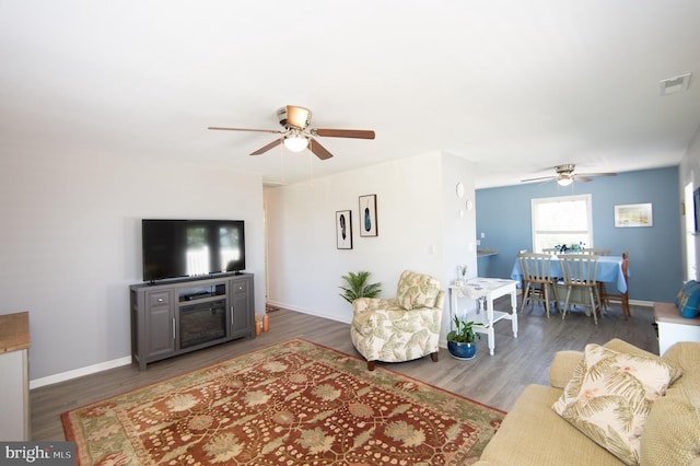 4906 Timbermarsh Ln, Woolford, MD 21677 - living area featuring ceiling fan, wood finished floors, and baseboards