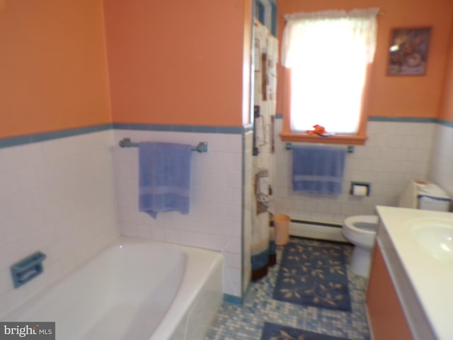 2713 Rowe Rd, New Windsor, MD 21776 - bathroom with a baseboard radiator, tile walls, vanity, wainscoting, and a bathtub