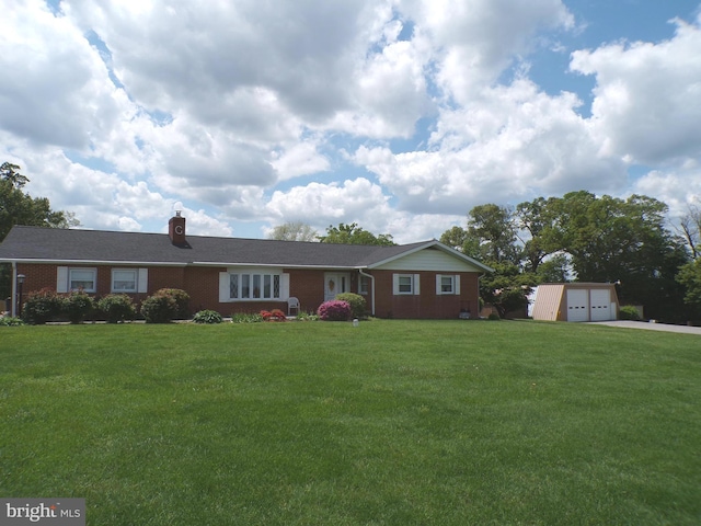 2713 Rowe Rd, New Windsor, MD 21776 - single story home featuring an outbuilding, brick siding, a front yard, a chimney, and driveway