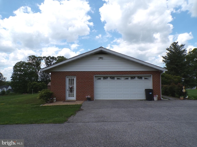2713 Rowe Rd, New Windsor, MD 21776 - single story home featuring brick siding, asphalt driveway, a front lawn, and an attached garage