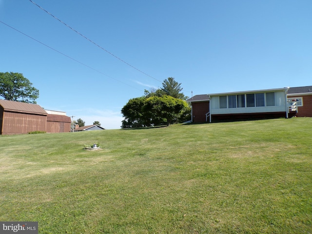 2713 Rowe Rd, New Windsor, MD 21776 - view of grassy yard featuring a sunroom