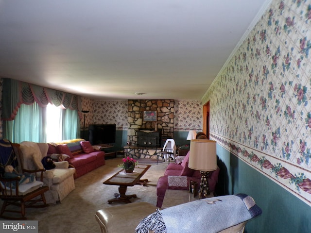 2713 Rowe Rd, New Windsor, MD 21776 - carpeted living room featuring wallpapered walls, a stone fireplace, and ornamental molding
