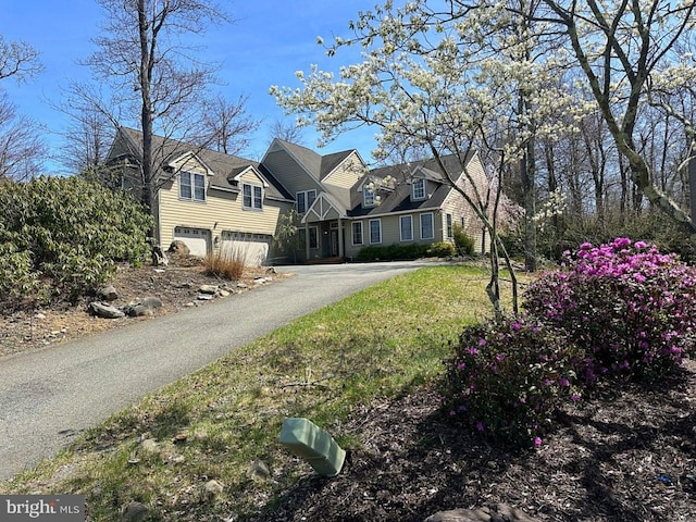 554 Pinecrest Dr, Pocono Pines, PA 18350 - view of front of home featuring driveway and a garage