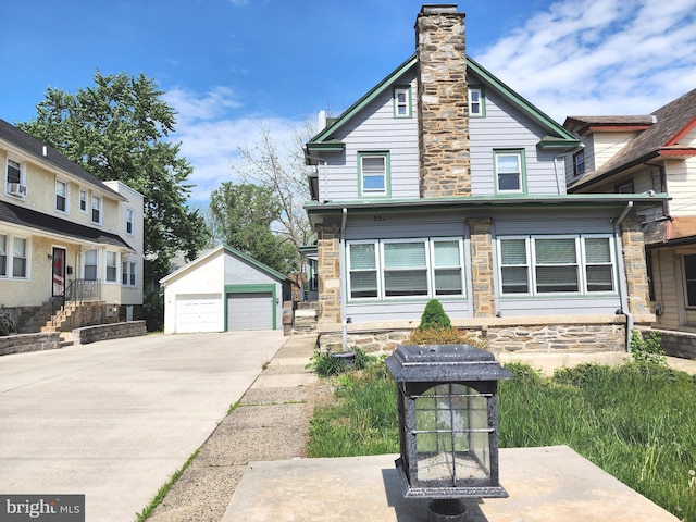 351 Congress Ave, Lansdowne, PA 19050 - view of front facade featuring an outdoor structure, a garage, stone siding, and a chimney