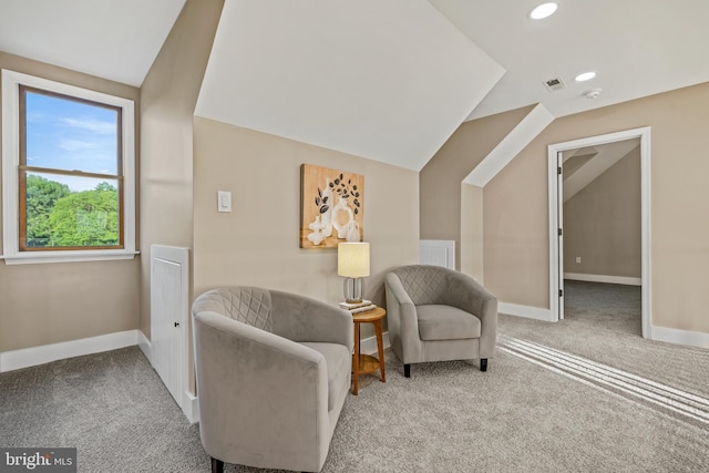living area featuring lofted ceiling, carpet floors, baseboards, and recessed lighting
