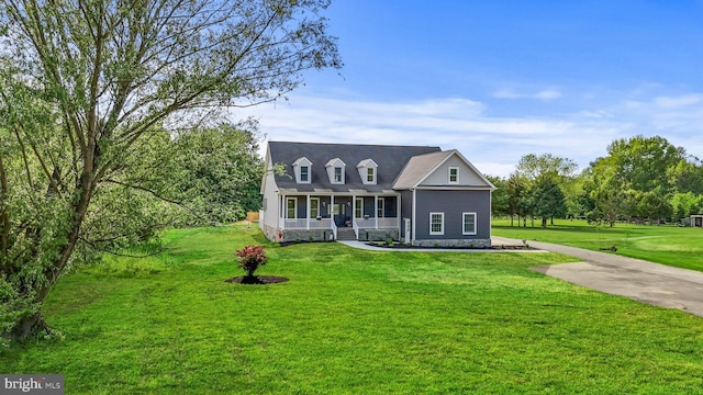 cape cod-style house with a porch and a front yard