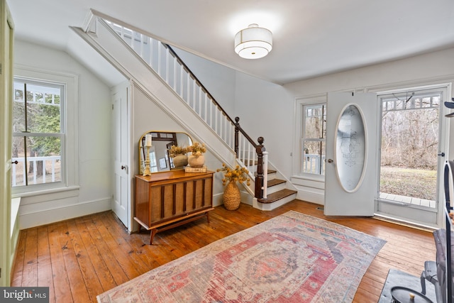 3947 Hebron Valley Rd, Madison, VA 22727 - foyer with stairs, hardwood / wood-style floors, vaulted ceiling, and baseboards