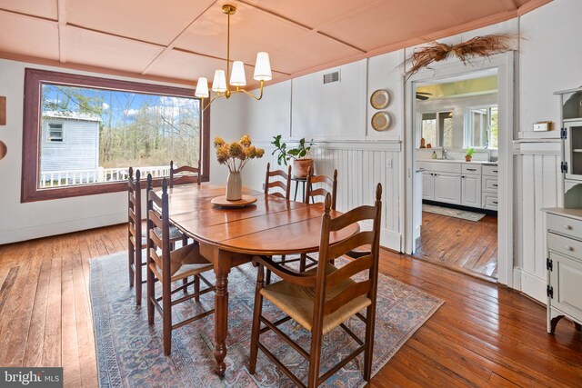 3947 Hebron Valley Rd, Madison, VA 22727 - dining room featuring wood-type flooring, healthy amount of natural light, and a chandelier