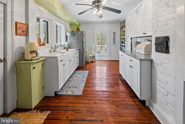 3947 Hebron Valley Rd, Madison, VA 22727 - kitchen featuring white cabinetry, dark wood-style floors, plenty of natural light, and a sink