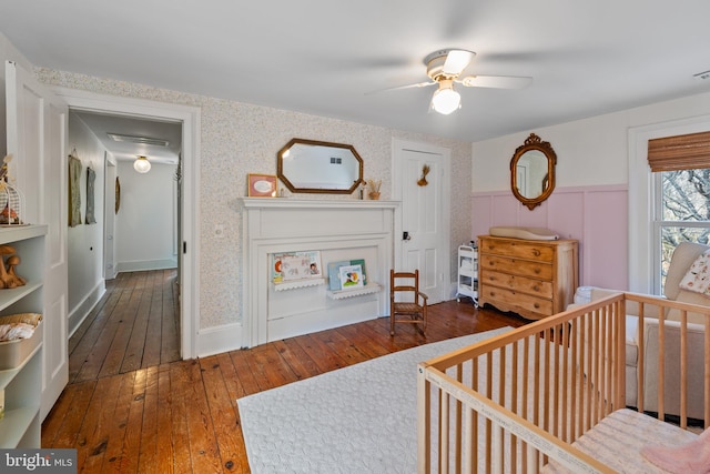 3947 Hebron Valley Rd, Madison, VA 22727 - bedroom featuring hardwood / wood-style floors, a nursery area, and ceiling fan