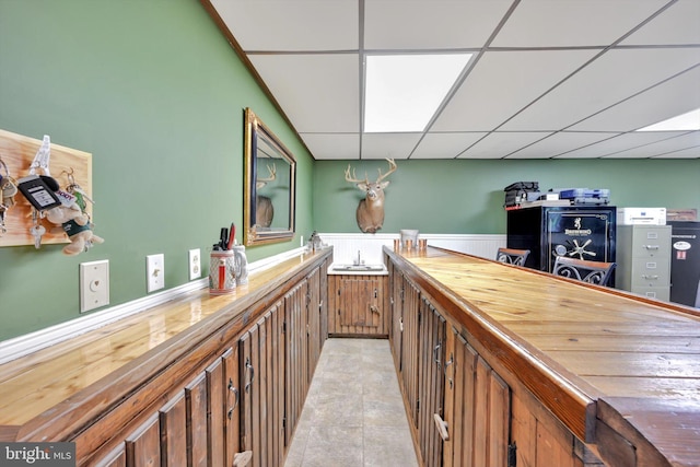 191 Meadow Dr, Mohrsville, PA 19541 - indoor wet bar with a wainscoted wall and a paneled ceiling