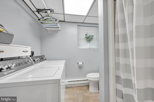 191 Meadow Dr, Mohrsville, PA 19541 - full bath with a baseboard radiator, washer and dryer, toilet, vanity, and tile patterned floors