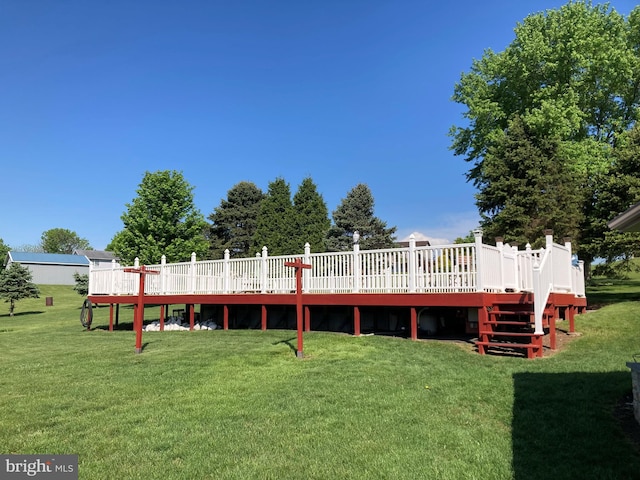 191 Meadow Dr, Mohrsville, PA 19541 - rear view of house with a wooden deck and a lawn