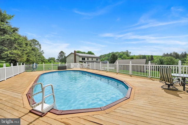191 Meadow Dr, Mohrsville, PA 19541 - view of pool with a deck, fence, and view of scattered trees