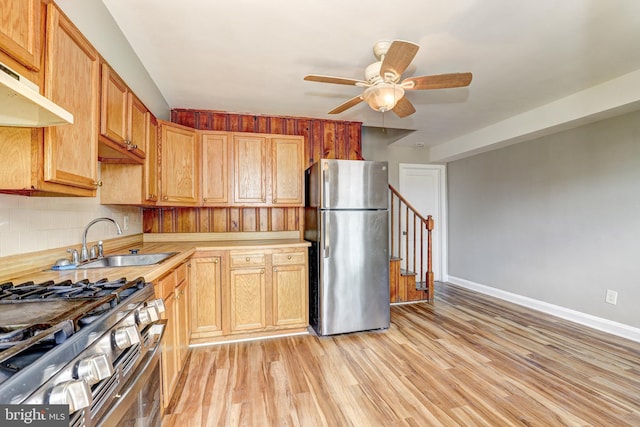 1334 Dalton Rd, Baltimore, MD 21234 - kitchen featuring appliances with stainless steel finishes, a sink, a ceiling fan, light countertops, and baseboards