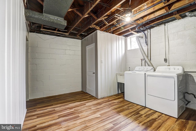 1334 Dalton Rd, Baltimore, MD 21234 - laundry area featuring separate washer and dryer and wood finished floors