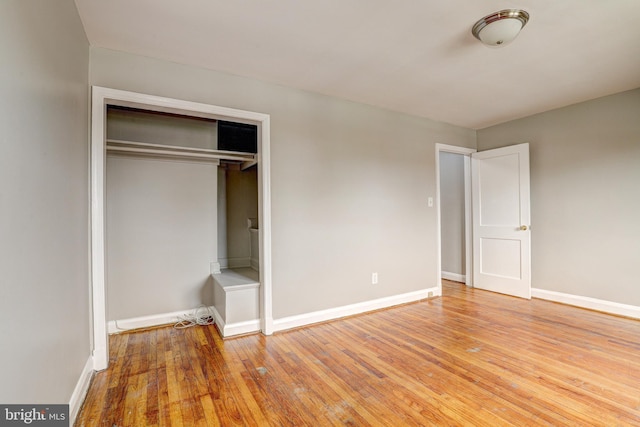 1334 Dalton Rd, Baltimore, MD 21234 - unfurnished bedroom with wood finished floors, baseboards, and a closet