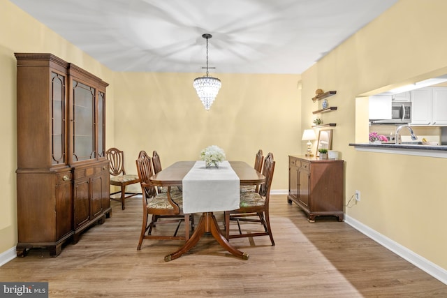 603 Admiral Dr Unit 204, Annapolis, MD 21401 - dining space with light wood-type flooring and baseboards