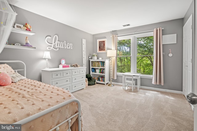 603 Admiral Dr Unit 204, Annapolis, MD 21401 - bedroom featuring light carpet and baseboards