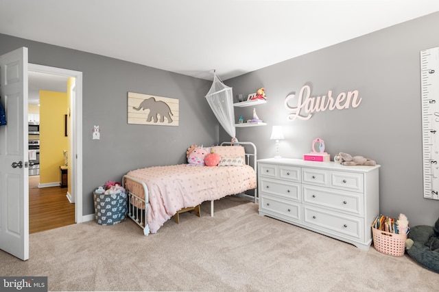 603 Admiral Dr Unit 204, Annapolis, MD 21401 - bedroom with light colored carpet and baseboards