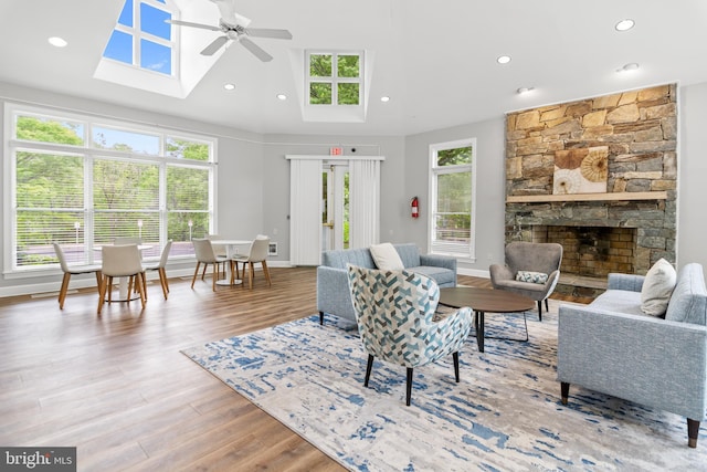 603 Admiral Dr Unit 204, Annapolis, MD 21401 - living room with a skylight, ceiling fan, plenty of natural light, lofted ceiling, and wood finished floors