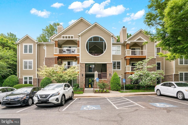 603 Admiral Dr Unit 204, Annapolis, MD 21401 - view of building exterior featuring uncovered parking