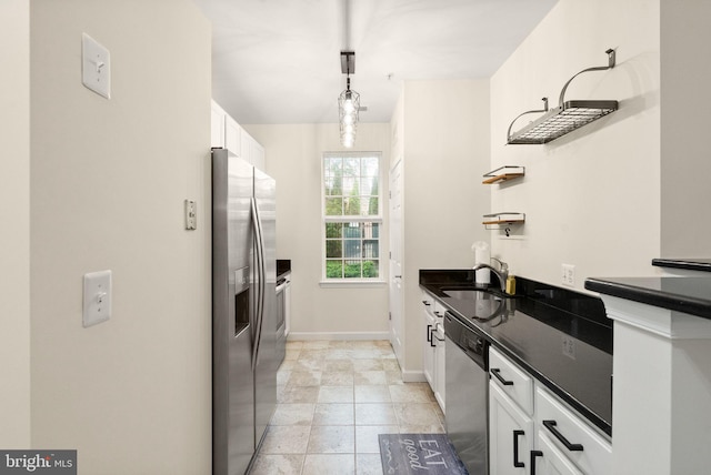 42432 Hollyhock Ter Unit 101, Brambleton, VA 20148 - kitchen featuring stainless steel appliances, a sink, white cabinetry, open shelves, and baseboards