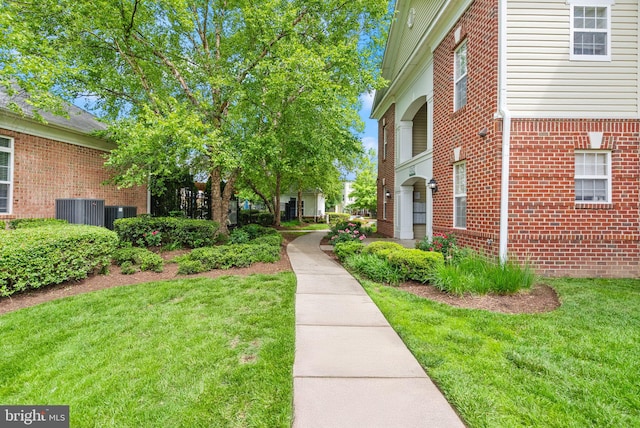 42432 Hollyhock Ter Unit 101, Brambleton, VA 20148 - surrounding community featuring a yard