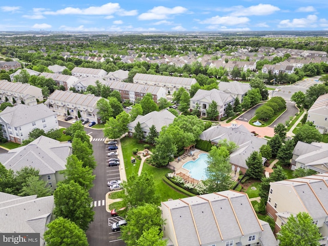 42432 Hollyhock Ter Unit 101, Brambleton, VA 20148 - aerial perspective of suburban area featuring a pool area
