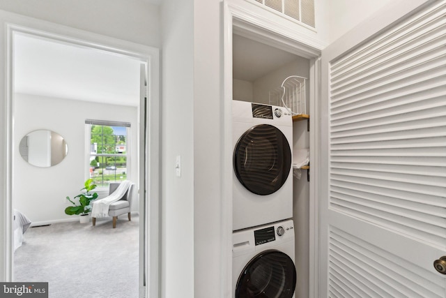 3316 Lakeside View Dr Unit 3-7, Falls Church, VA 22041 - washroom featuring stacked washer / drying machine, carpet floors, and baseboards
