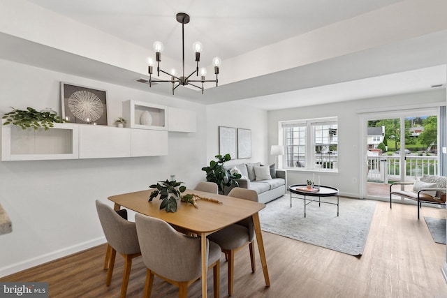 3316 Lakeside View Dr Unit 3-7, Falls Church, VA 22041 - dining area featuring a chandelier, baseboards, and wood finished floors