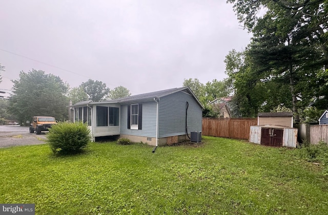 3365 Arundel On The Bay Rd, Annapolis, MD 21403 - view of side of home with central air condition unit, a sunroom, and crawl space