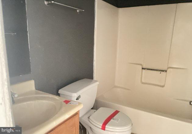 3365 Arundel On The Bay Rd, Annapolis, MD 21403 - full bathroom with vanity, toilet, and  shower combination