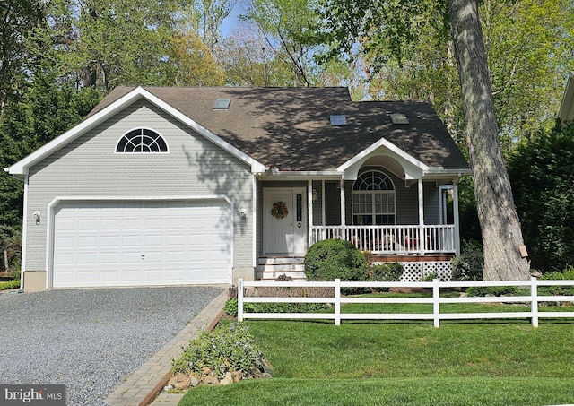 21 Links Ln, Ocean Pines, MD 21811 - view of front of house featuring a garage, a porch, gravel driveway, and roof with shingles