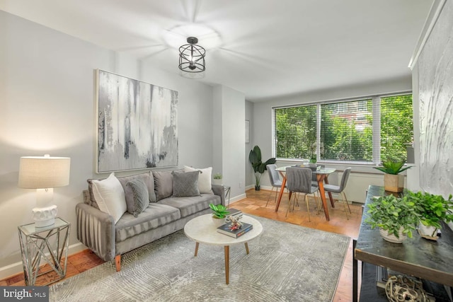 2829 Connecticut Ave NW Unit 312, Washington, DC 20008 - living room with baseboards and wood finished floors