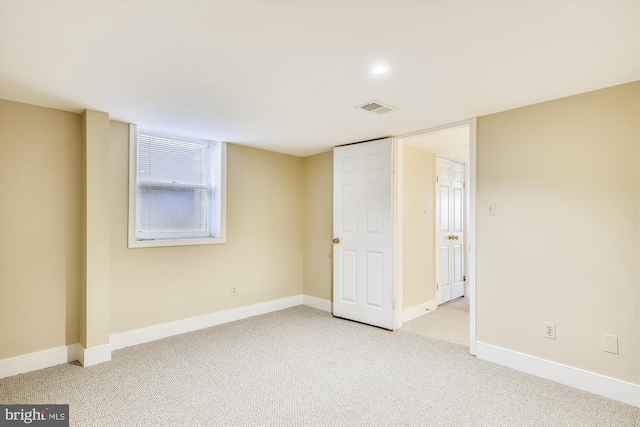 basement with carpet flooring, baseboards, and recessed lighting