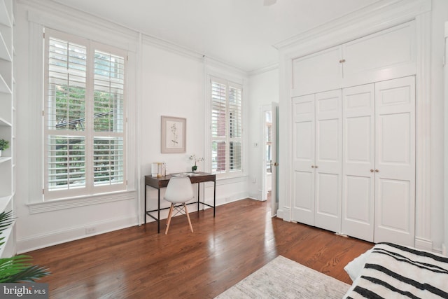 101 2nd St NE Unit 1, Washington, DC 20002 - bedroom featuring wood finished floors, baseboards, a closet, ornamental molding, and an office area