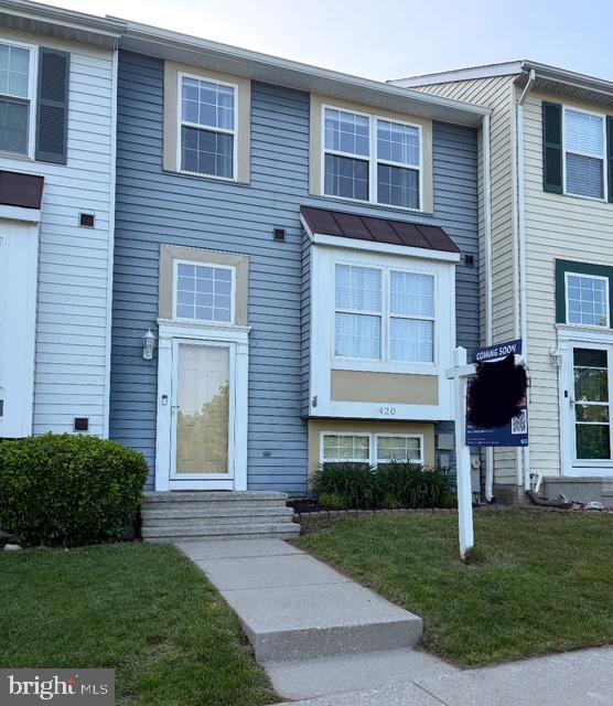 420 Hobbitts Ln, Westminster, MD 21158 - view of property featuring entry steps, a front lawn, and a standing seam roof